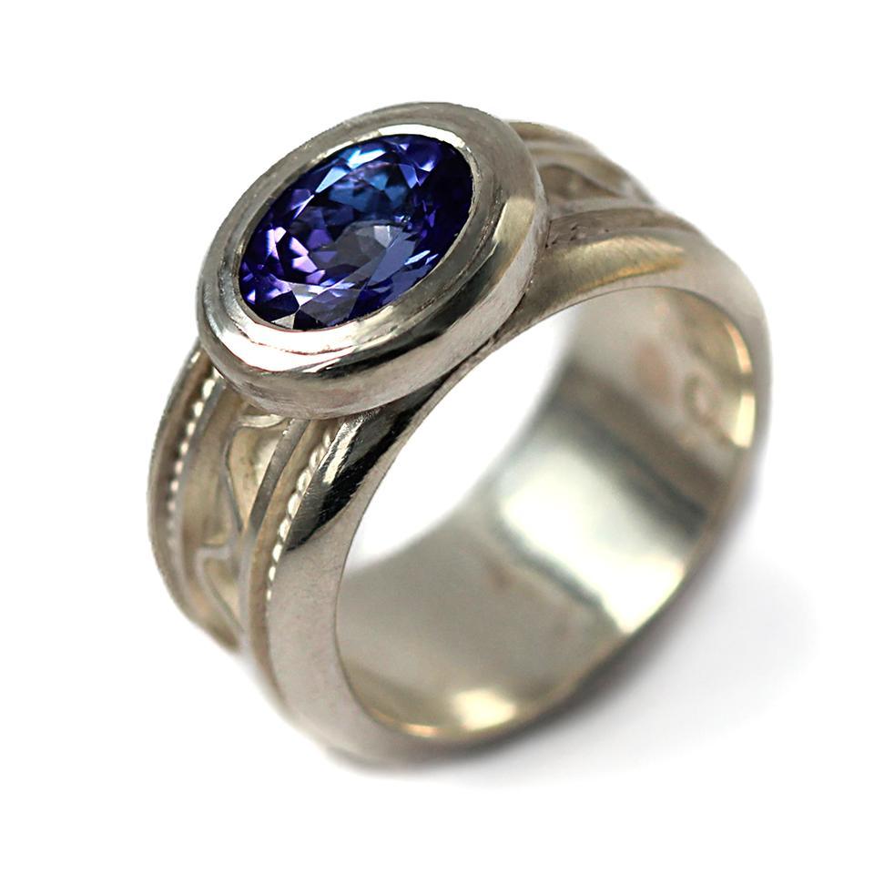 silver or gold misti ring with blue Tanzanite gemstone