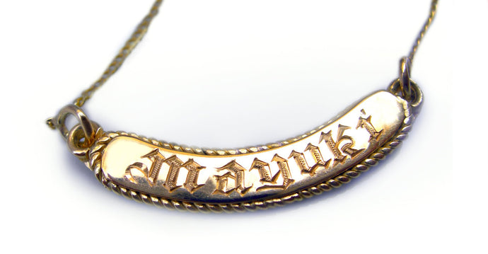 gold hip hop name bar necklace in yellow gold and handmade engraving