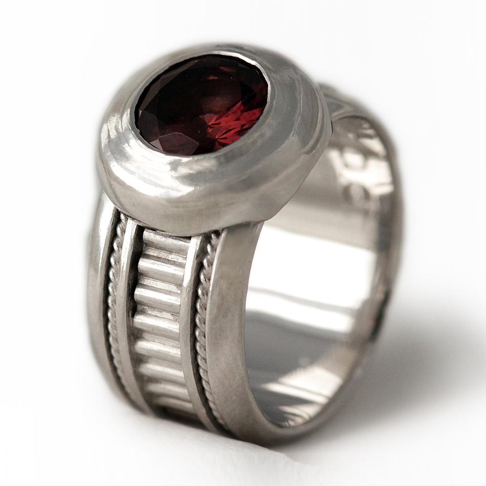 Red garnet in silver misti wedding band