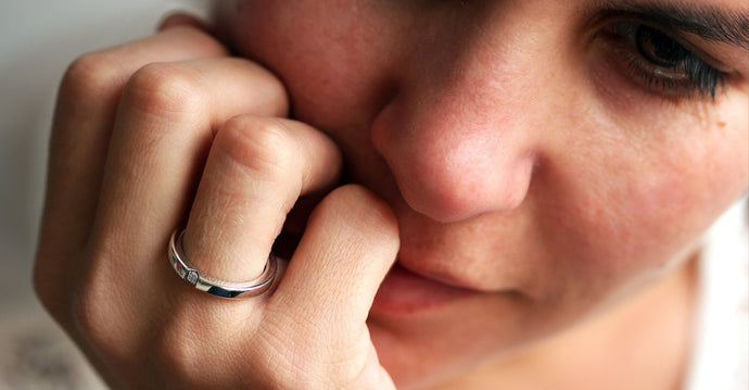 Woman wearing a promise rings for her