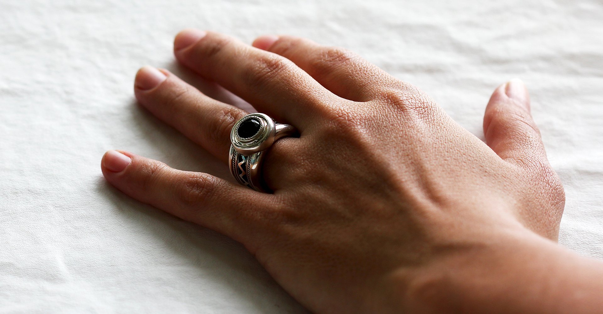 wide misti wedding band with black stone for men