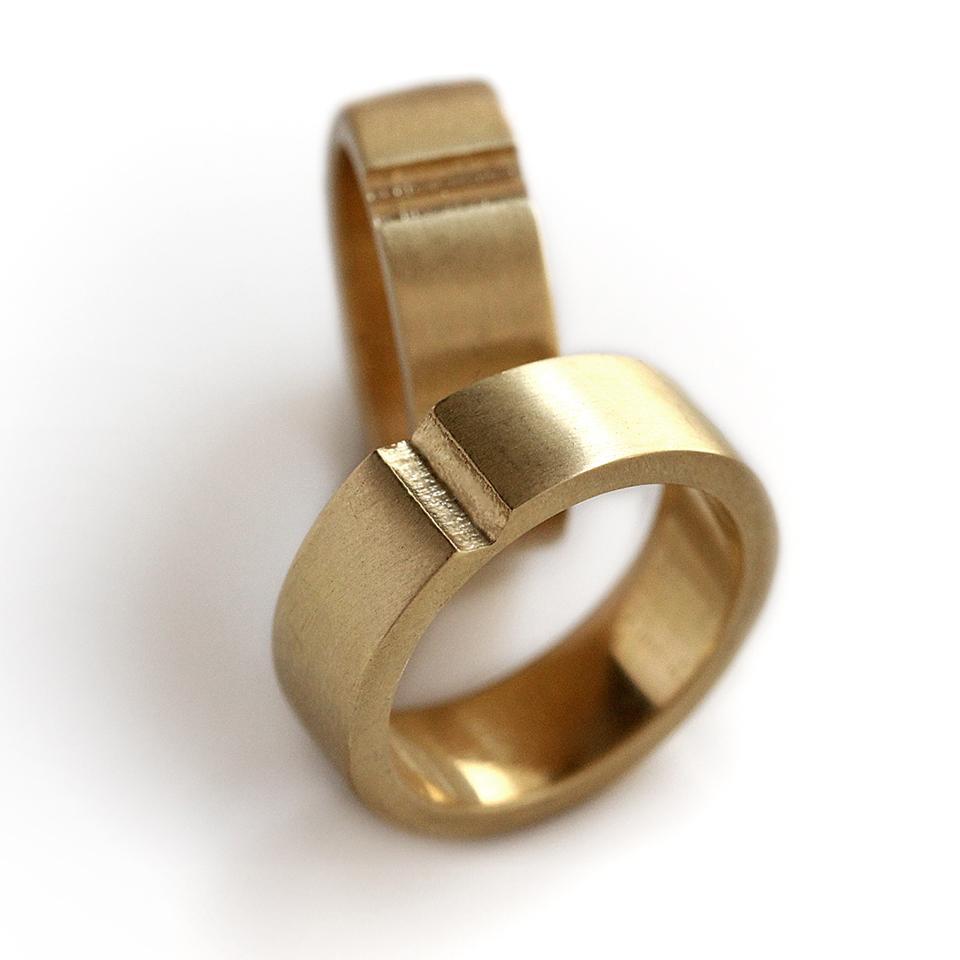 gold wedding band for matching couples with heart shape