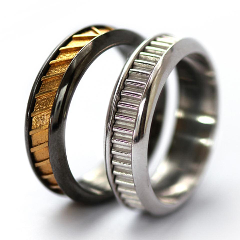 Black and gold and silver wedding band rings