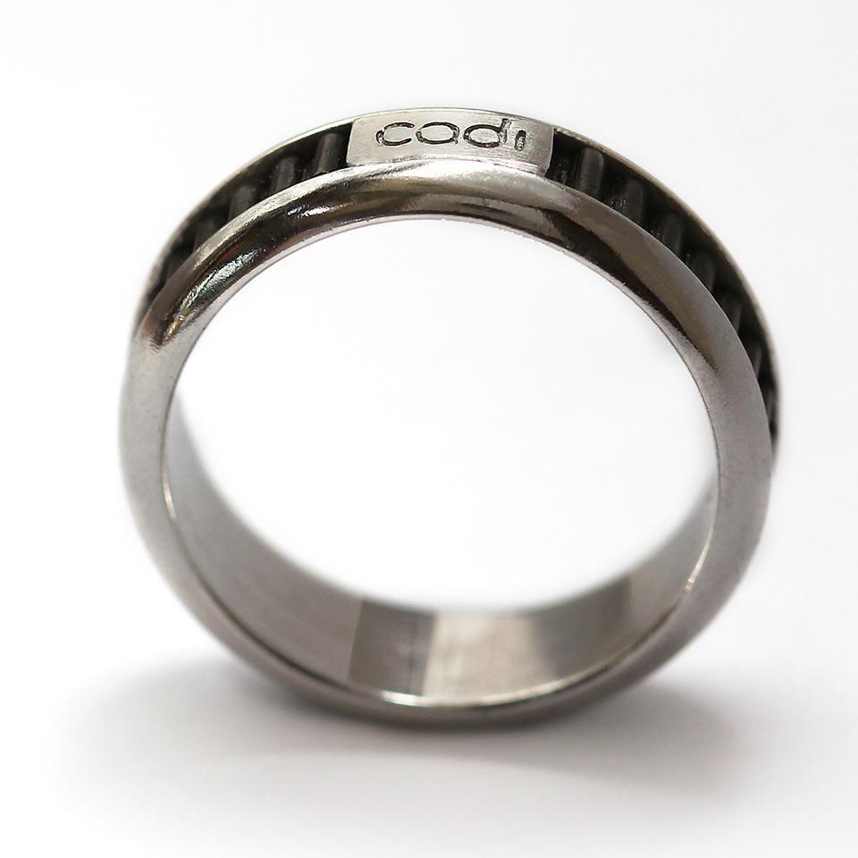 Coil black designer promise ring for couples