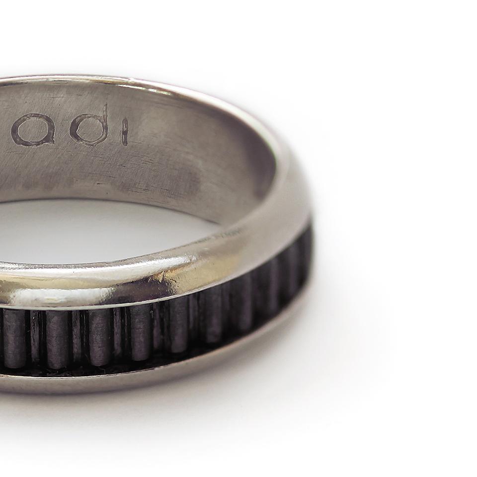 Coil black designer promise ring for couples