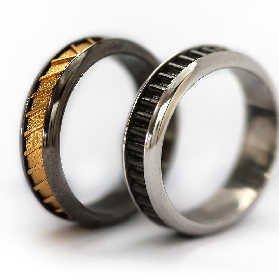 Coil yellow and black designer promise rings for couples