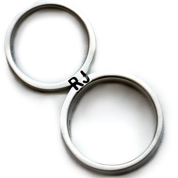 Cadi personalized matching ring set with engraved initials across bands of different widths