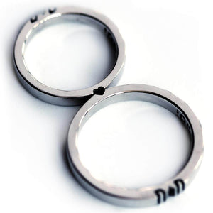 Detail of the engraved letter halves aligned across the two 3mm rings
