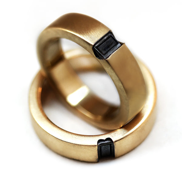 Custom 18K gold wedding bands with emerald cut black diamonds, wide band matching rings handcrafted Barcelona jewelry, unique couple wedding set