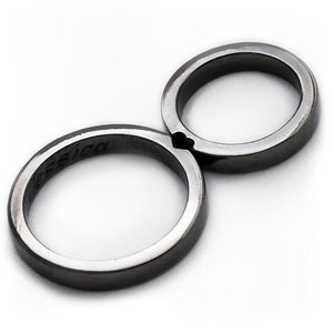 Cadi black rhodium wedding rings joined to reveal a hidden heart between the bands