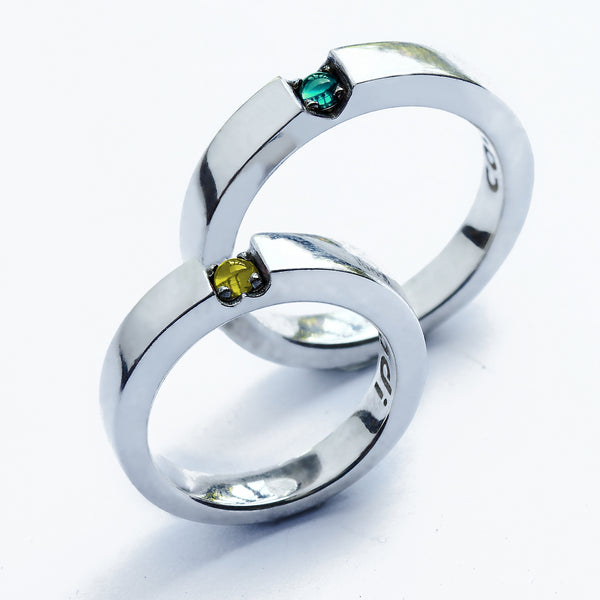 Hidden heart wedding rings citrine and tsavorite garnet forming symbol when united, matching white gold bands with personalized engraving, handmade Barcelona jewelry