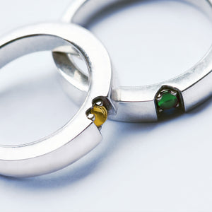 Matching wedding rings citrine and tsavorite forming hidden heart when placed together, handcrafted white gold bands Barcelona artisan jewelry, rare gemstone couple set