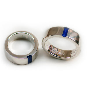 hidden heart couple rings dark blue enamel   forming split heart detail in modern wedding bands design. relationship totems secret heart rings