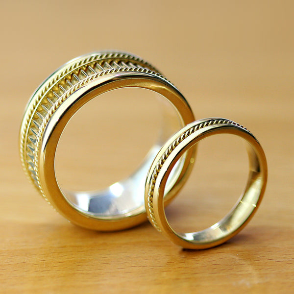 His and hers handcrafted wedding ring set in yellow gold with vintage fluted design, filigran and purple sapphire gemstone detail