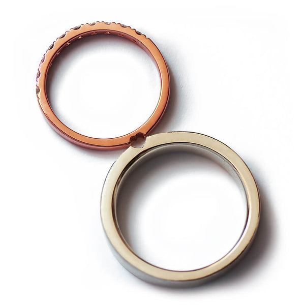Cadi two-tone promise rings with a pavé diamond band and a hidden heart connection