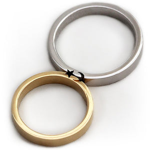 Cadi moon and star wedding ring set with a white diamond and split celestial engravings