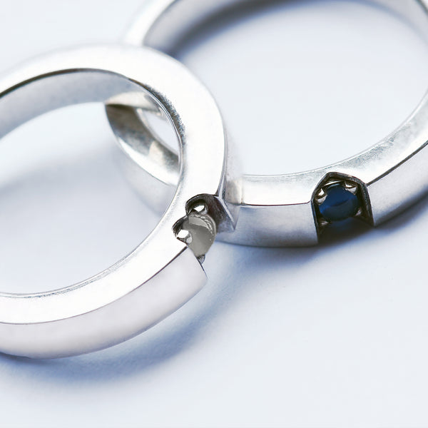 Hidden heart wedding rings moonstone and sapphire forming symbol when united, handmade white gold matching bands Barcelona artisan jewelry