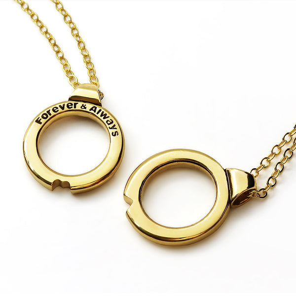 Two piece couples necklace with removable interlocking circle pendants forming a heart shape when combined, symbolic relationship jewelry