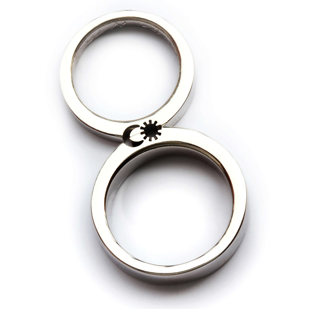 Cadi sun and moon ring set with wide and narrow bands aligned to complete the celestial design