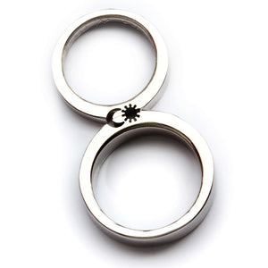 Cadi sun and moon ring set with wide and narrow bands aligned to complete the celestial design