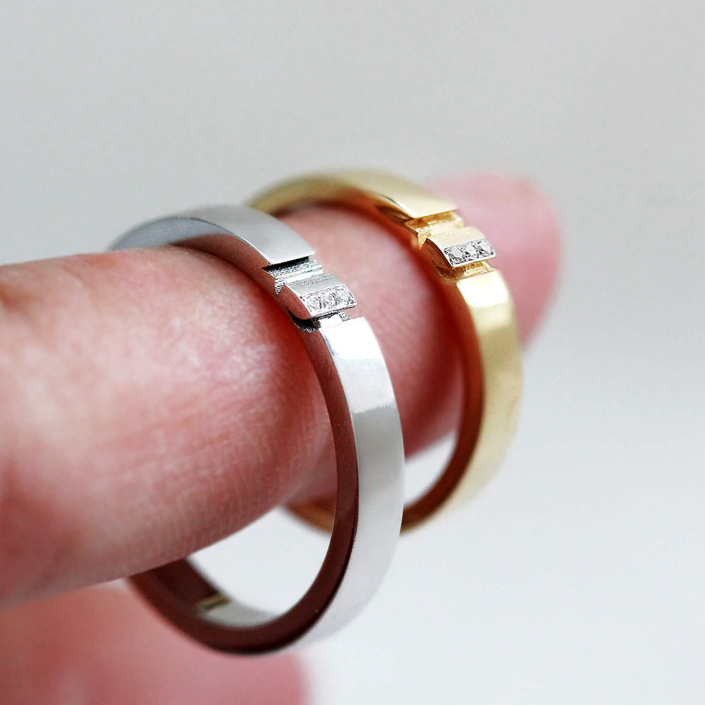 Cadi moon and star wedding ring set with a white diamond and split celestial engravings