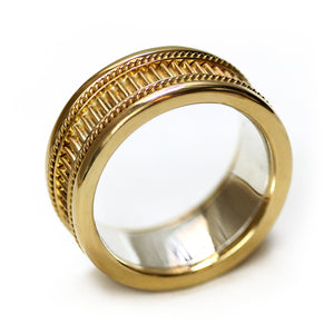 Side view artisan wide gold men’s wedding band with natural purple sapphire gemstone