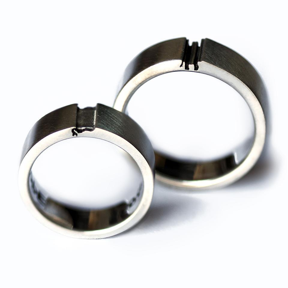 Cadi bold elephant couple rings joined to reveal a unified elephant symbol