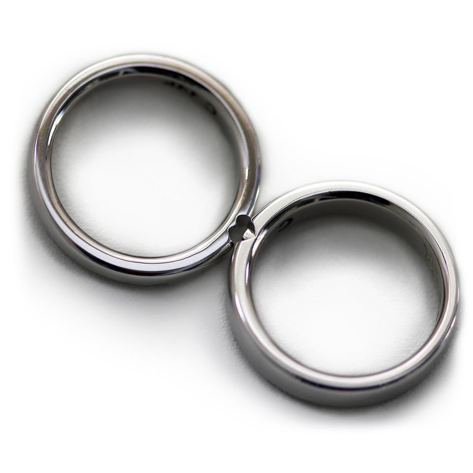 Cadi diamond promise ring set with a wide three-stone band and a narrow matching band
