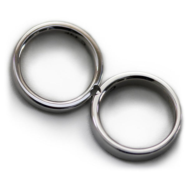 Cadi diamond promise ring set with a wide three-stone band and a narrow matching band