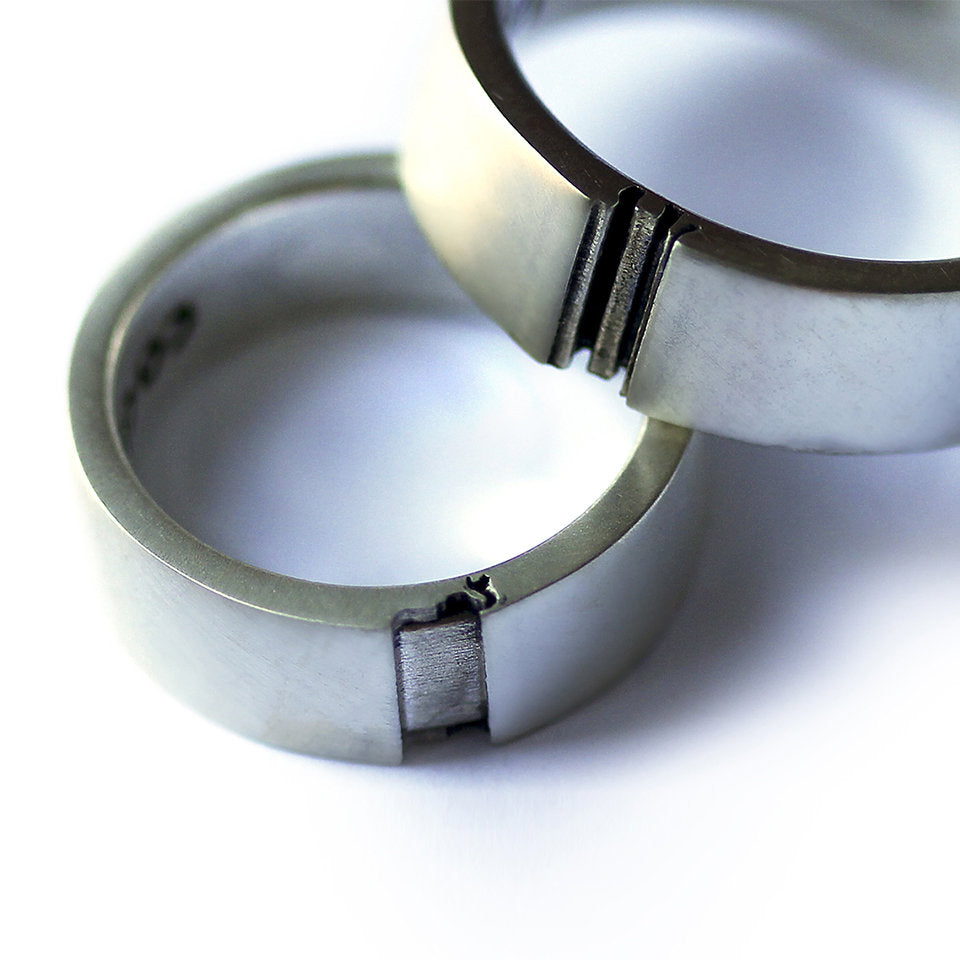 Couple rings set with engraved, elephant design