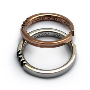 rose gold and silver promise ring set engraved with initials