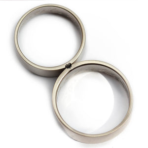 Detail of the contrasting white and black diamond settings across the matte bands