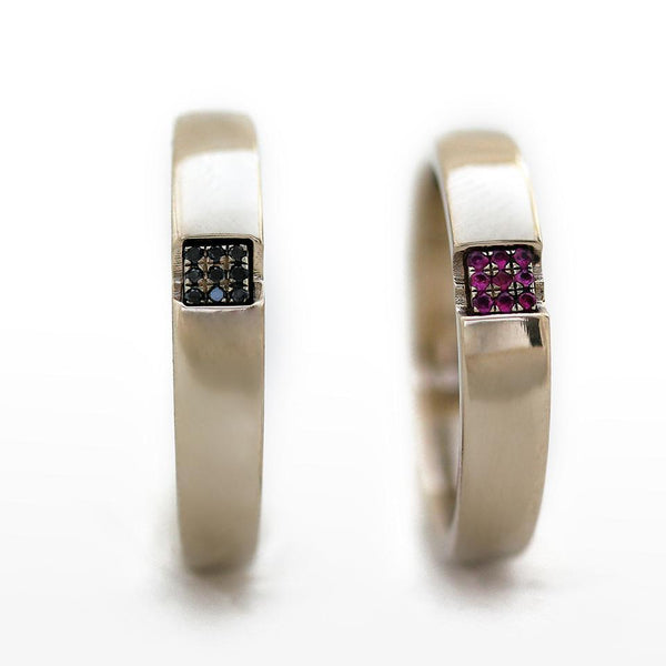 Two mens wedding bands with sapphire ruby emeralds