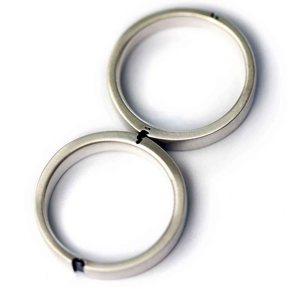 Cadi bunny and carrot couple rings joined to complete the playful animal symbol