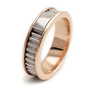 Coil rose gold and white gold wedding ring
