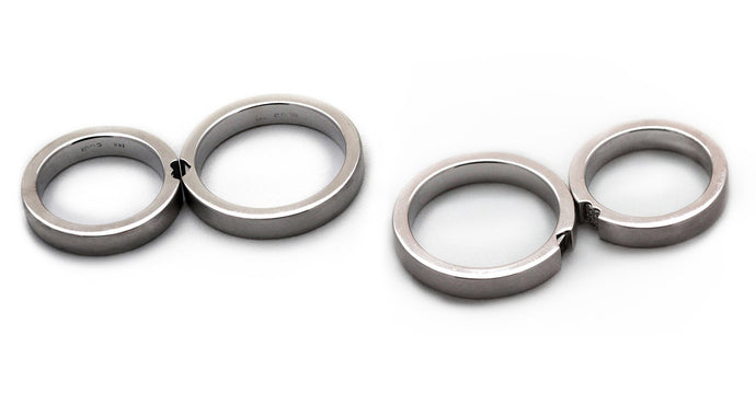 Two white gold promise rings for couples with diamonds