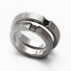 Two white gold promise rings for couples with diamonds