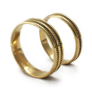 yellow gold romise ring set with braided filigree