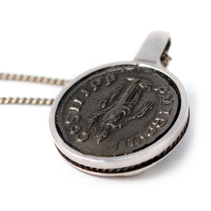back side of roman coin in silver or white gold necklace