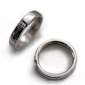 Pair of his and hers white gold promise rings