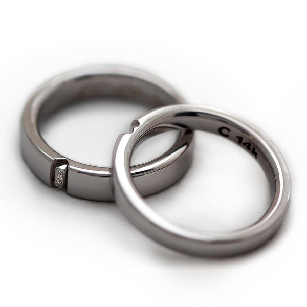 Pair of his and hers white gold promise rings