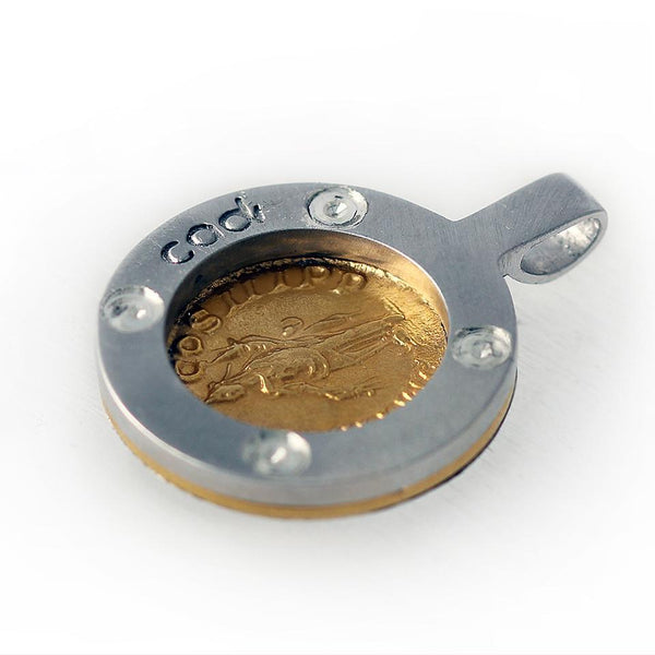 Back side of a Roman coin necklace that shows its an original coin of Alexander Severus