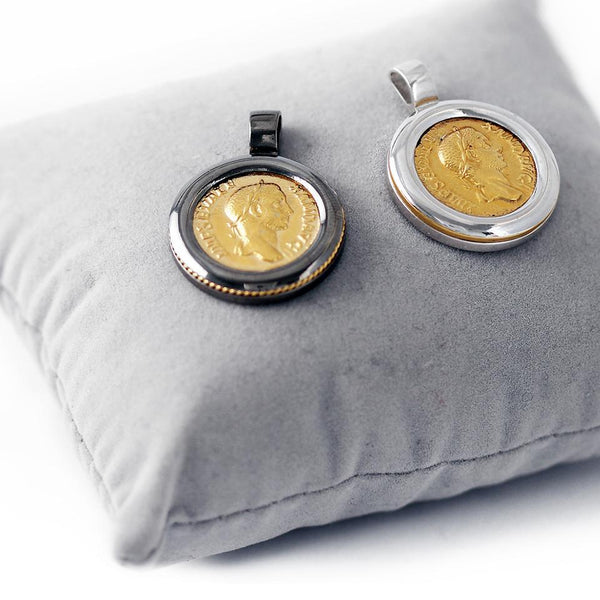 two Roman coin necklaces with different finishes, one  black Rhodium and one sterling silver