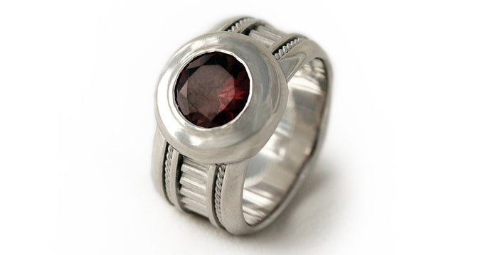 Red garnet in silver misti wedding band