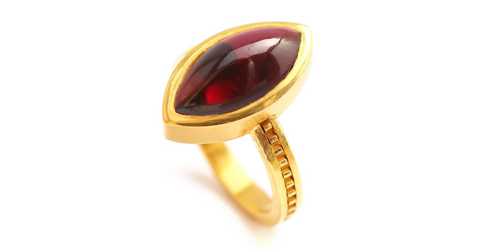 red Garnet gemstone on gold or silver engagement ring