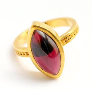 red Garnet gemstone on gold or silver engagement ring