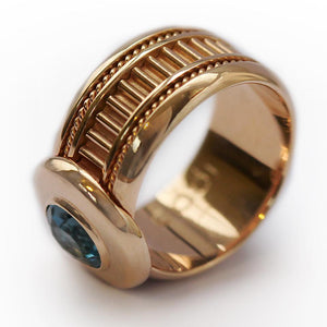 Rose gold with blue Topaz gemstone misti ring