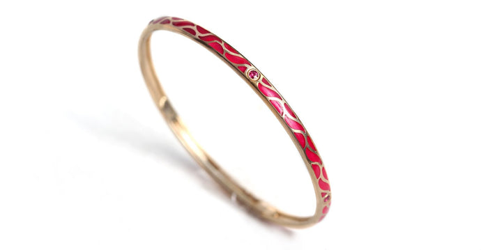 gold bangle with Ruby set in Great wave 