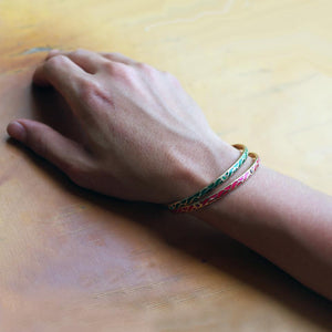 gold bangle with Ruby set in Great wave 