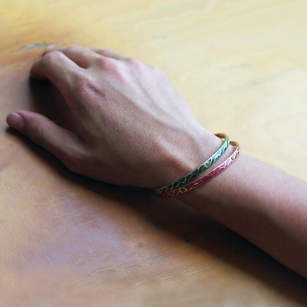 gold bangle with Ruby set in Great wave 